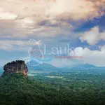 ANCIENT CITY OF SIGIRIYA panorama Sunrise view to Sigiriya rock - Lion Rock - from Pidurangala Rock